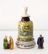 A celadon plate painted with flowers and insects,