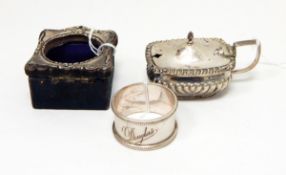 A silver mustard pot of half fluted rectangular form with hinged cover,