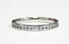 Platinum and diamond half eternity ring