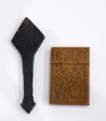 A carved wooden card case,