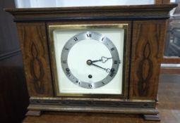 An Elliott eight-day clock with striking movement,