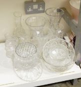 A large quantity of cut glass including vases, jugs, fruit bowls, etc.