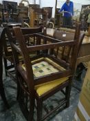 A set of eight 19th century dining chairs with yellow seats,
