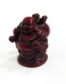 An Oriental carved model of Buddha type figure