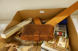 A bakelite handled manicure and travelling vanity set in folding leather case,