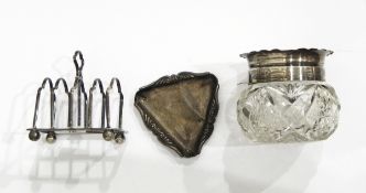 A small silver four-division toast rack,