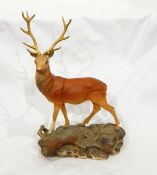 A Beswick model of a stag modelled on a naturalistic base, No.