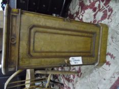 A walnut side cabinet pot cupboard opening to reveal one shelf,
