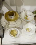 Susie Cooper 'Sunflower' pattern tableware including plates of various sizes, bowls, gravy jug, etc.