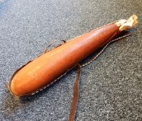Four large water carrying gourds with beadwork and shell decoration and another bulbous (5)