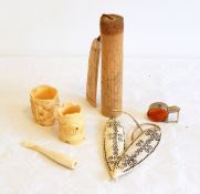 PLEASE NOTE NAPKIN RINGS REMOVED Two bone fish-decorated napkin rings (possibly African),