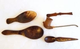 A carved and stained ivory palette type knife, horn spoon,