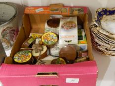 A collection of Wade ornaments including characters from Walt Disney films in their original boxes