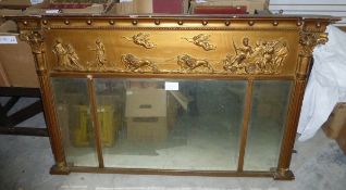 A Regency gilt overmantel mirror of rectangular form,