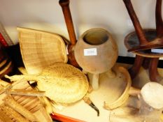 A quantity of African wooden household items including spoons, vessels, pestles,