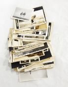 An early 20th century scrapbook, a quantity of photographs,