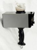 A Seafix Laboratories Yachting instrument (possibly a radio and compass)