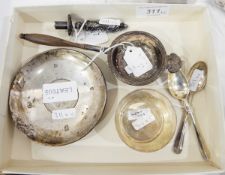 A silver dish, a shallow silver bowl, a silver tea strainer,