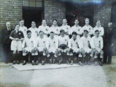 Photograph of cricket team with cup, signed in margin, framed,