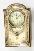 A silver mounted mantel clock,