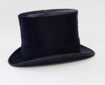 A black top hat named 