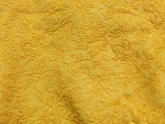 A pair of vintage brocade gold-coloured curtains along with a quilted bedspread made by Ventona (1