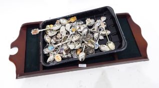 A silver plated tray of circular design with pierced borders, a silver plated butter dish and cover,