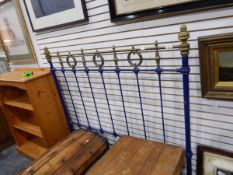 A wrought iron blue single bed