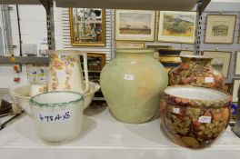 A ewer, basin and toothbrush holder, cream ground with rose garlands,