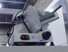 An electric meat slicer