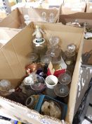 A black painted metal magazine rack, a brass-coloured metal folding fireguard,