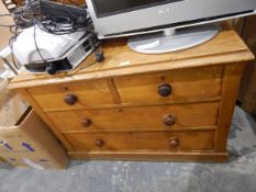 A 19th century pine chest of two short and two long drawers, on plinth base,