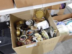 Various ceramic plates and brass coloured metal clocks