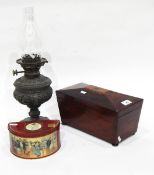 A 19th century mahogany sarcophagus-shaped tea caddy,
