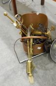 A quantity of copper and brassware to include coal buckets, bed warmer, fire irons, etc.
