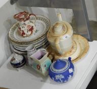 An 18th century Chinese sparrowbeak jug painted with sprigs of flower in puce,