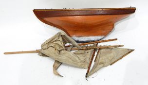 A painted wooden pond yacht,