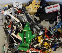 A large quantity of assorted toys including model cars and aeroplanes (2 boxes)