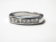 Platinum and princess cut half eternity ring,