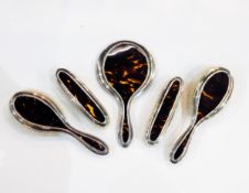 Five piece dressing table set, tortoiseshell backed with silver mounts, W. J.