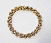 18ct gold and diamond bracelet (matching lot 422),