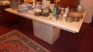 A 20th century contemporary designer travertine marble dining table,