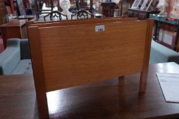 A retro teak Canterbury of two divisions.