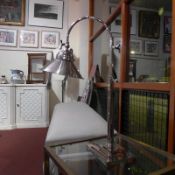 A pair of Nickel plated Art Deco style desk lamps on stepped oblong bases.