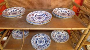 A set of six Mintons soup bowls and the matching set of six plates,