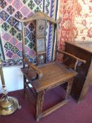 A pair of 19th Century Chinese hardwood armchairs having carved and pierced detail to the splat