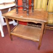A French parquetry inlaid oak two tier occasional table.