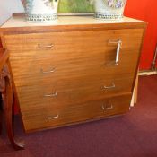 A mid 20th Century mahogany and formica top chest,