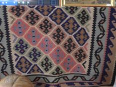 A fine south west Persian Qashgai Kilim 194cm x 93cm reporting all over geometrical motifs within