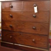 A 19th century mahogany chest fitted two short and three long drawers with knob handles and raised